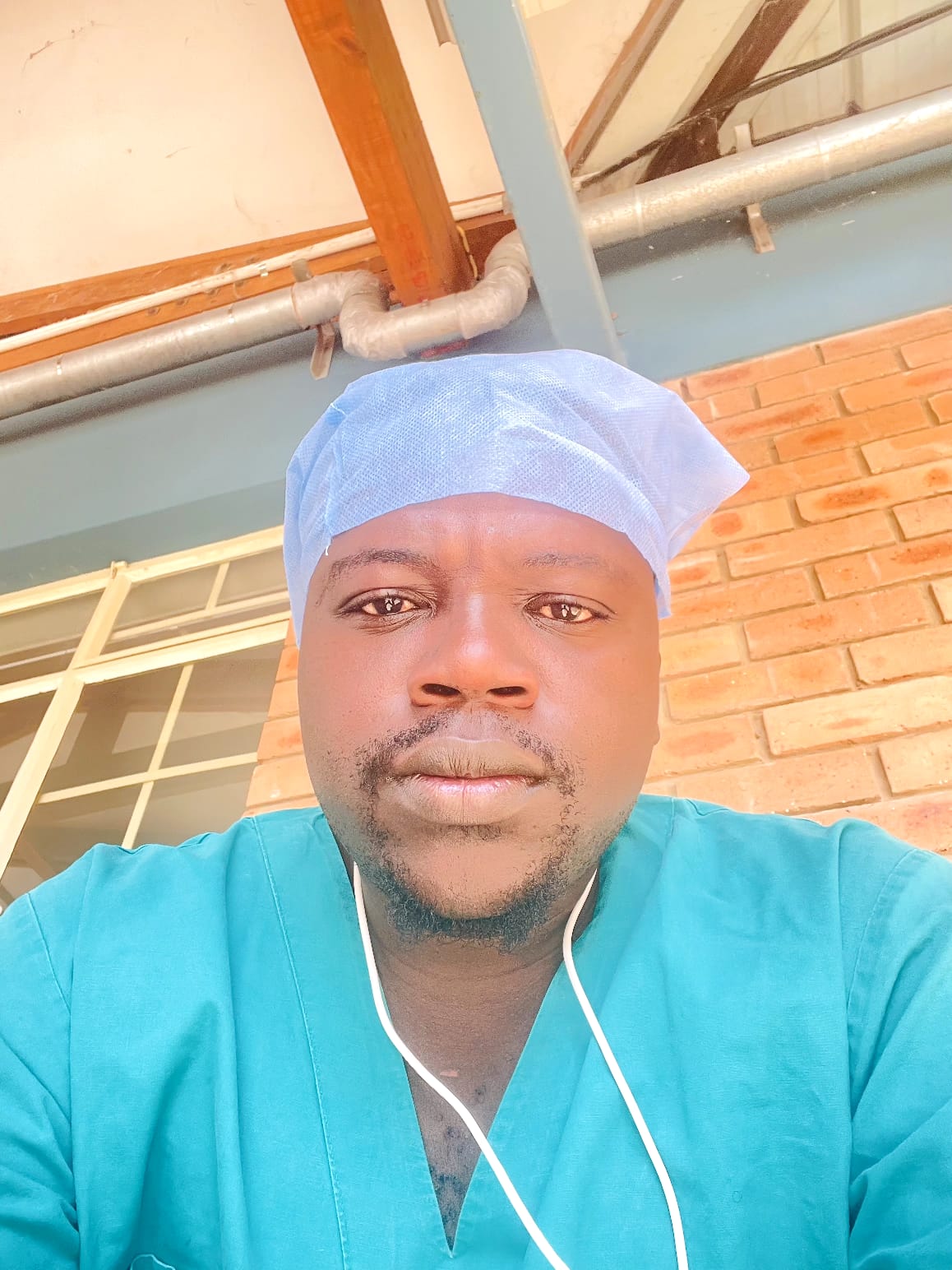 Dr Nyiko E Vukeya reviewing patient notes